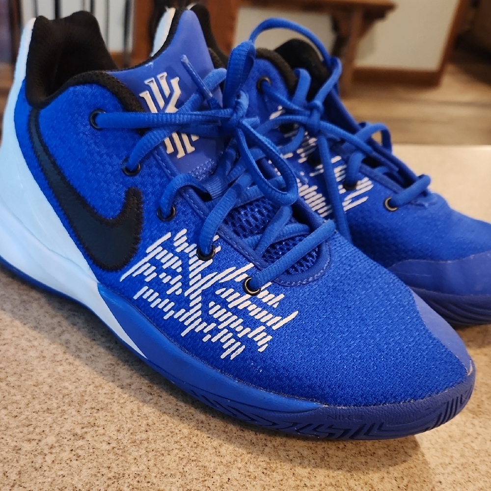 Nike Blue and Black Sneakers with Modern Design